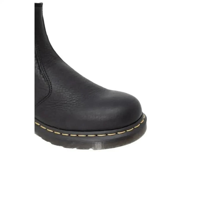 Dr. Martens men boots - sleek black Chelsea boot on display