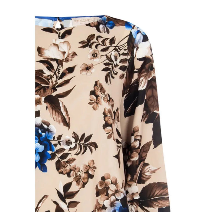 Floral patterned fabric featuring brown and blue flowers on beige for Rinascimento blouse