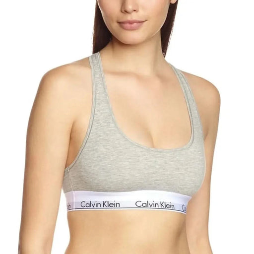 Gray Calvin Klein sports bra with white elastic band, part of Calvin Klein Underwear Women’s collection