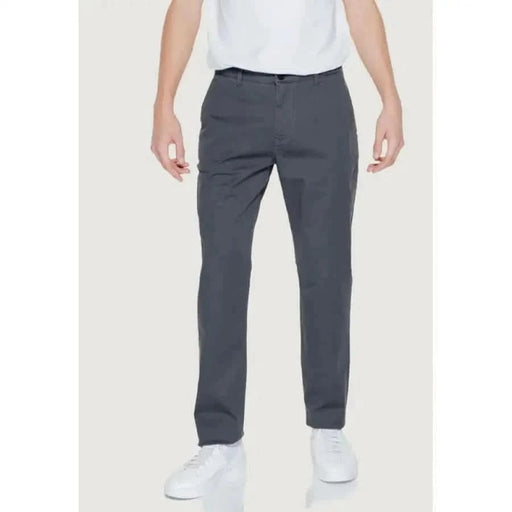 Gray dress pants with a white shirt and sneakers from Armani Exchange Men Trousers