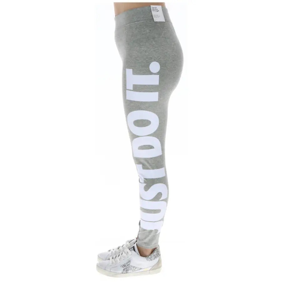 Nike Women’s Gray Leggings with ’JUST DO IT’ in white print along the leg