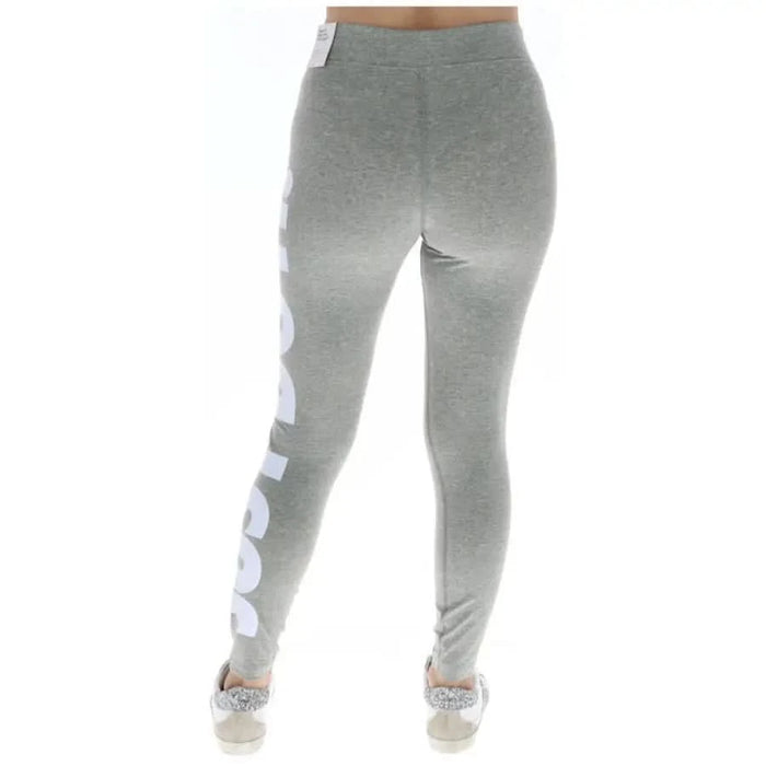 Nike Women Leggings - Gray with White Text on the Side for Stylish Comfort and Performance