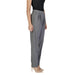 Gray pleated dress pants with tapered legs paired with nude heels from Vila Clothes