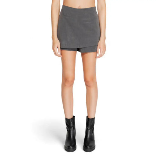 Gray skort styled with black ankle boots from Only Women Short collection