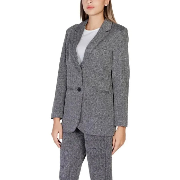 Gray tweed blazer worn by a woman over a white top from Ichi Women Blazer collection