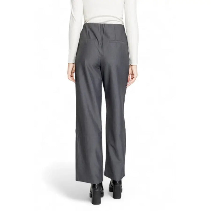 Gray wide-leg dress pants for women, viewed from behind, by Only