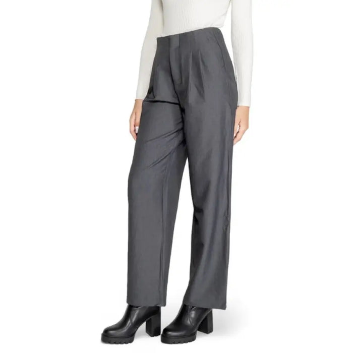 Gray wide-leg trousers paired with black chunky heeled boots from Only Women Trousers