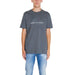 Grey Armani Exchange Men T-Shirt featuring white text logo design