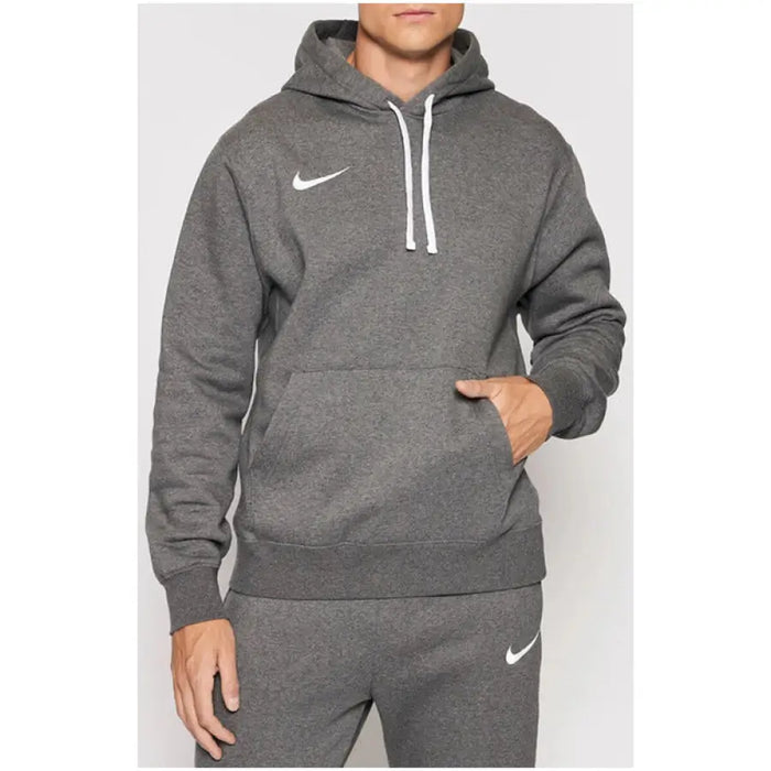 Grey Nike pullover hoodie with white drawstrings and logo for men, featuring front pockets