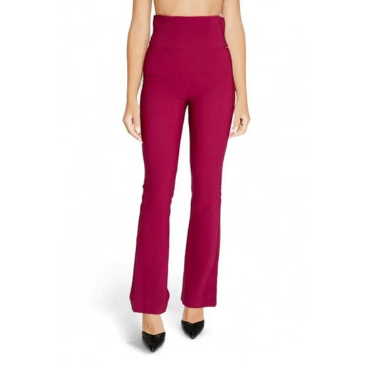 High-waisted burgundy flared pants with black heels from Rinascimento Women Trousers