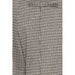 Houndstooth patterned fabric of Ichi - Ichi Women Trousers, possibly from a suit jacket or blazer