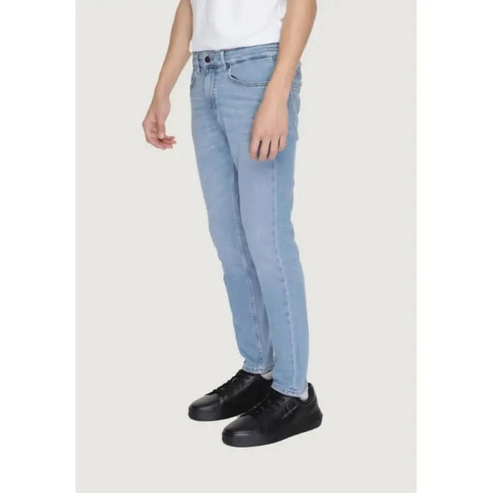 Indian Garage men’s blue slim fit jeans for Boss, showcasing urban city style fashion