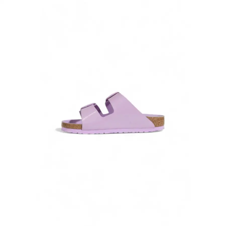 Lavender-colored Birkenstock sandal with cork sole and two straps for women