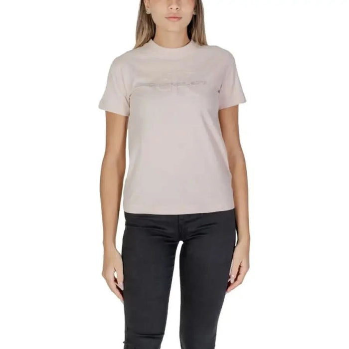 Light beige Calvin Klein Jeans t-shirt featuring subtle text across the chest