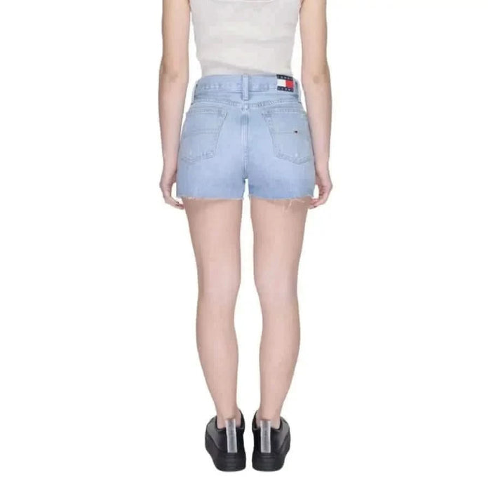 Light blue Tommy Hilfiger denim shorts with logo on back pocket. Elegant and stylish for women