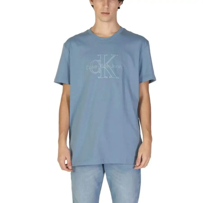 Light blue Calvin Klein Jeans T-shirt featuring CK logo design on chest