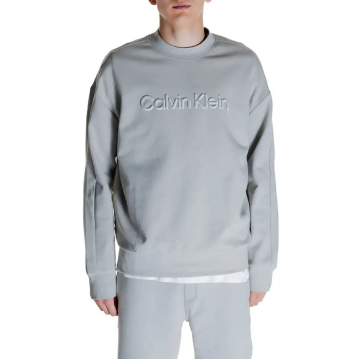 Light gray Calvin Klein sweatshirt with embossed logo on chest in Calvin Klein Men Sweatshirts