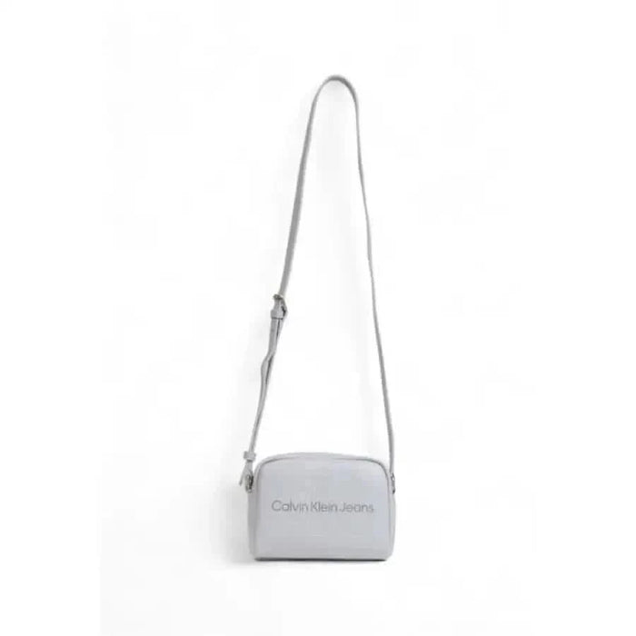 Light gray crossbody bag featuring Calvin Klein Jeans branding for women