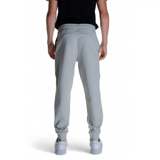 Light gray Calvin Klein Men’s joggers worn by a model