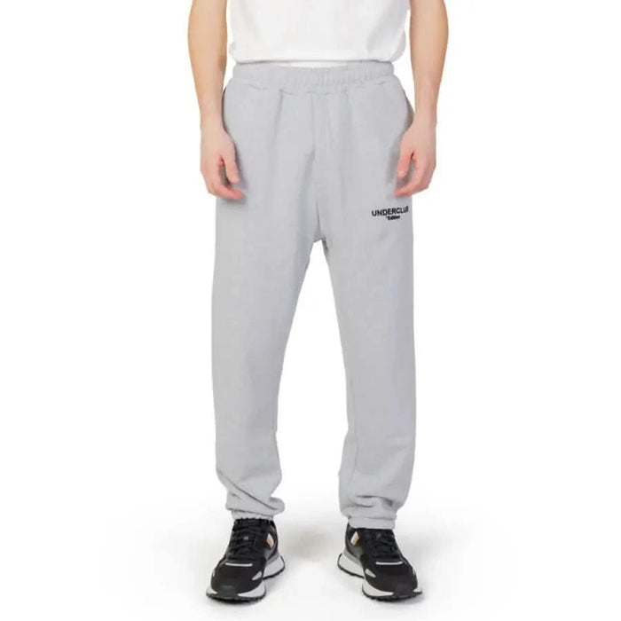 Light gray sweatpants with UNDERCLAS print on left leg from Underclub - Underclub Men Trousers