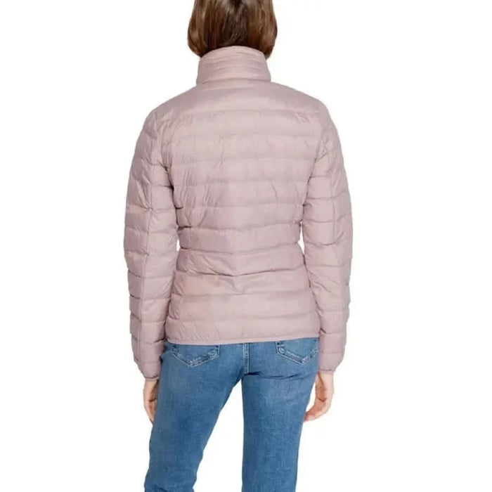 Light pink quilted puffer jacket worn by person, showcasing Ea7 Women Jacket design