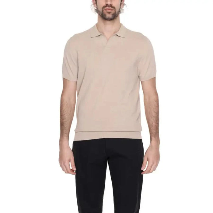 Man wearing beige polo shirt from Diktat - Diktat Men Knitwear collection