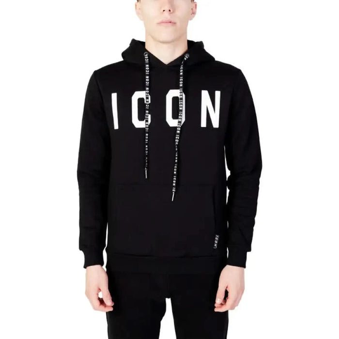 Man in Icon black hoodie, perfect for urban style clothing and city fashion