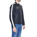 Man in Blauer urban style clothing, black jacket with white logo, for city fashion