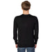 Man in black sweater and jeans from Liu Jo Men Knitwear collection by Liu Jo