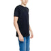 Man in black Hydra Clothing t-shirt and jeans, urban fashion attire