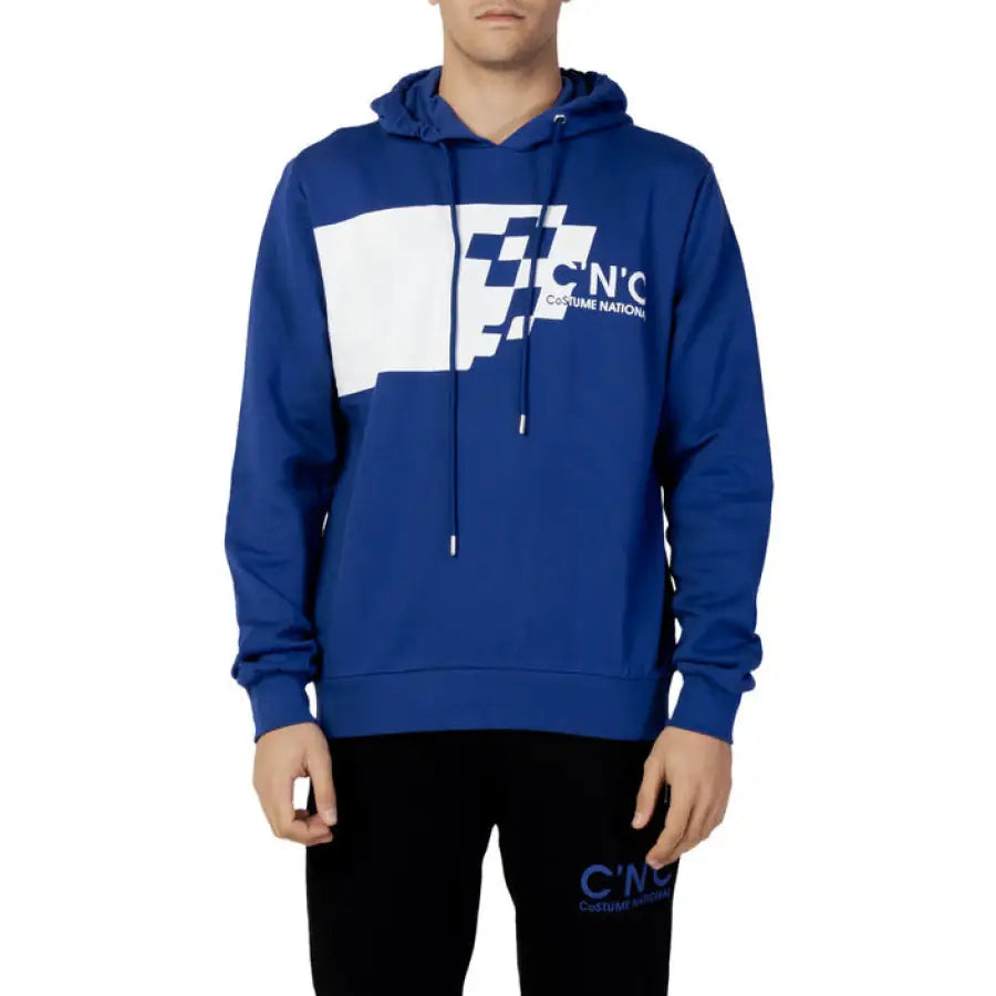 Man wearing a blue FCC hoodie from Cnc Costume National Men’s Sweatshirts collection