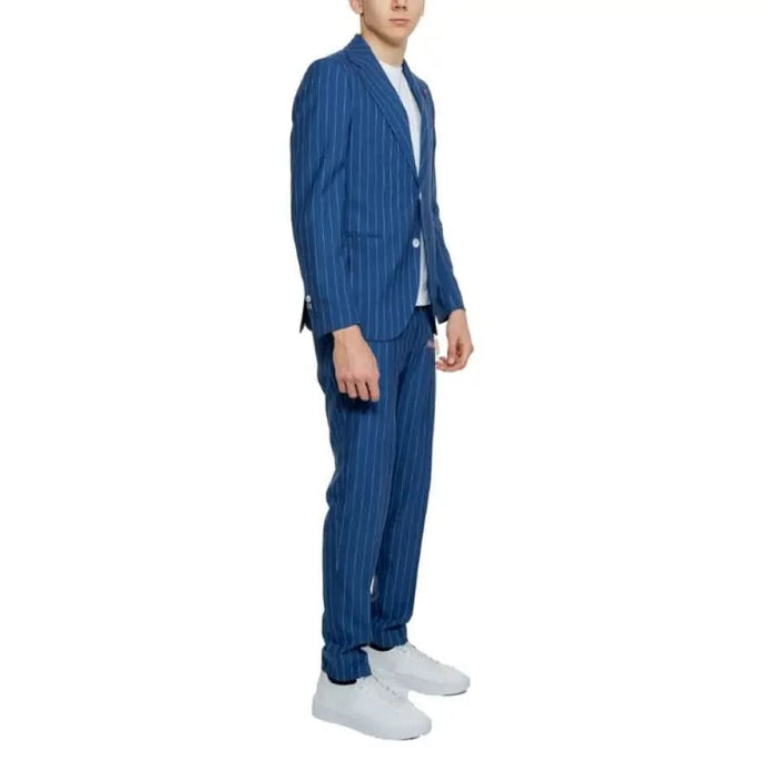 Man in a blue suit and white sneakers from Mulish Men Suit collection