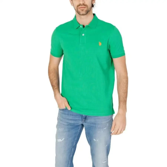 Man in green U.S. Polo Assn shirt, spring summer product for men.