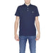 Man in navy U.s. Polo Assn. polo shirt with white chest logo - U.s. Polo Assn. Men Polo