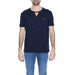 Man wearing Alviero Martini Prima Classe navy V-neck tee with chest patch