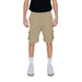 A man in shorts and a black shirt from the Pharmacy - Pharmacy Men Shorts collection