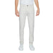 Urban style: Man in white pants and white sneakers from Borghese Men Trousers collection