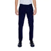 Man in white shirt and black Antony Morato trousers - sleek urban style