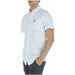 Lyle & Scott men shirt, model in white shirt and black shorts by Scott Lyle