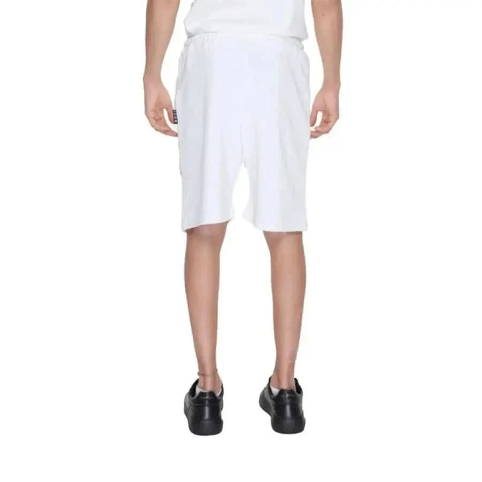 Man modeling Icon Men Shorts for urban city style fashion