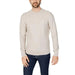 Man wearing a white sweater from Boss - Boss Men Knitwear collection