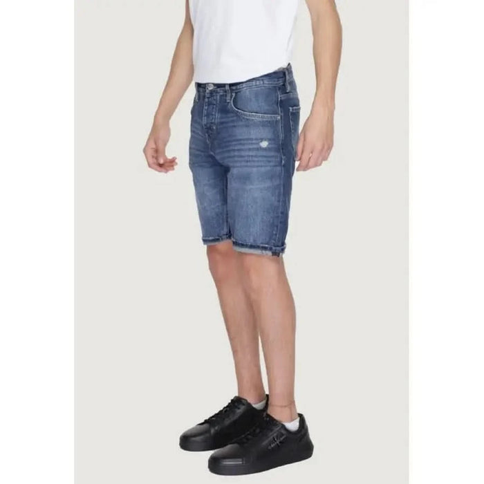 Antony Morato men shorts in urban style, man in white t-shirt and blue denim