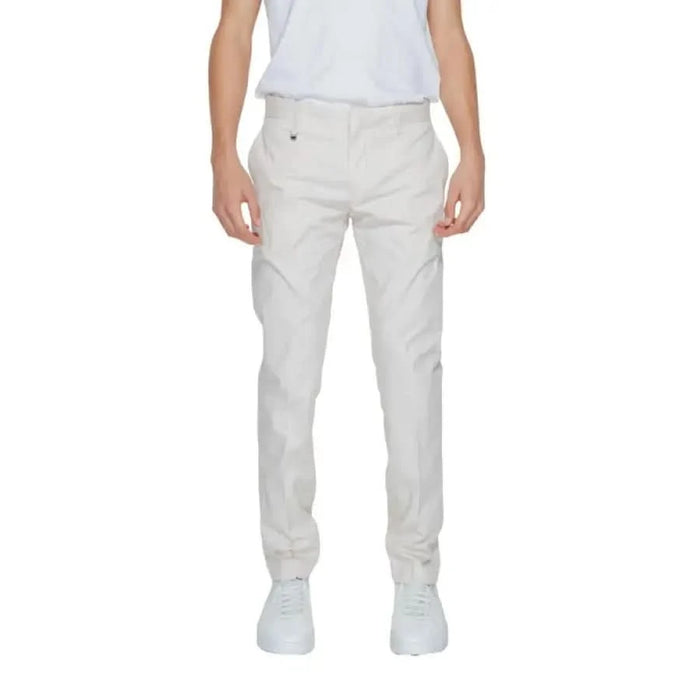 Man in white t-shirt and pants, Antony Morato urban style trousers