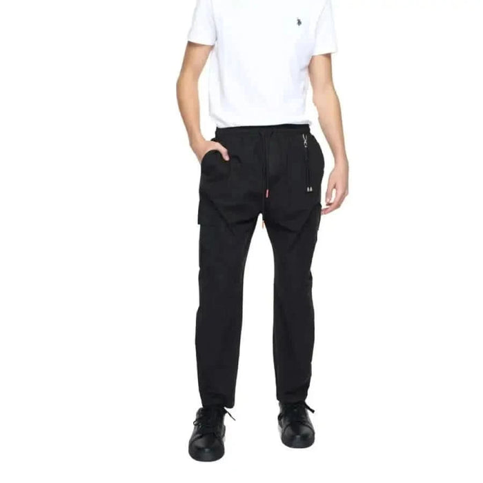 Man wearing Gianni Lupo Men Trousers, white t-shirt, and black pants