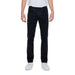 Urban style: Man in white t-shirt and black Jeckerson men trousers