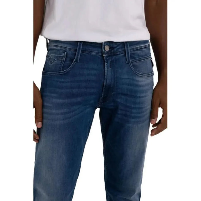 Man in white t-shirt and jeans showcasing Replay urban city style clothing