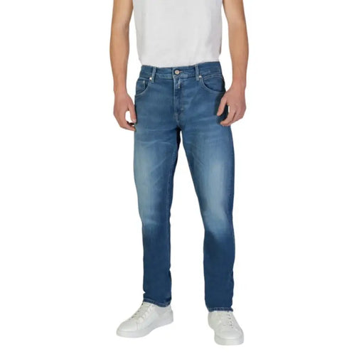 Medium-wash straight-leg denim jeans by Replay with zip and button details in blue