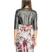 Metallic grey cropped jacket with three-quarter sleeves over floral print garment by Rinascimento