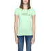 Mint green Armani Exchange t-shirt paired with blue jeans for a trendy look