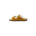 Mustard yellow suede Birkenstock sandal with white fleece lining for women